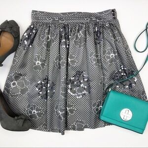 Metallic gray sequin floral fit and flare skirt